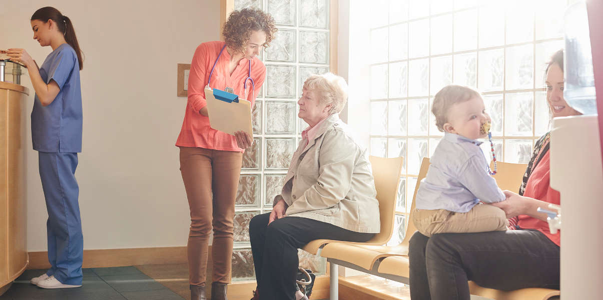 Patients waiting in a bright medical receptiona area